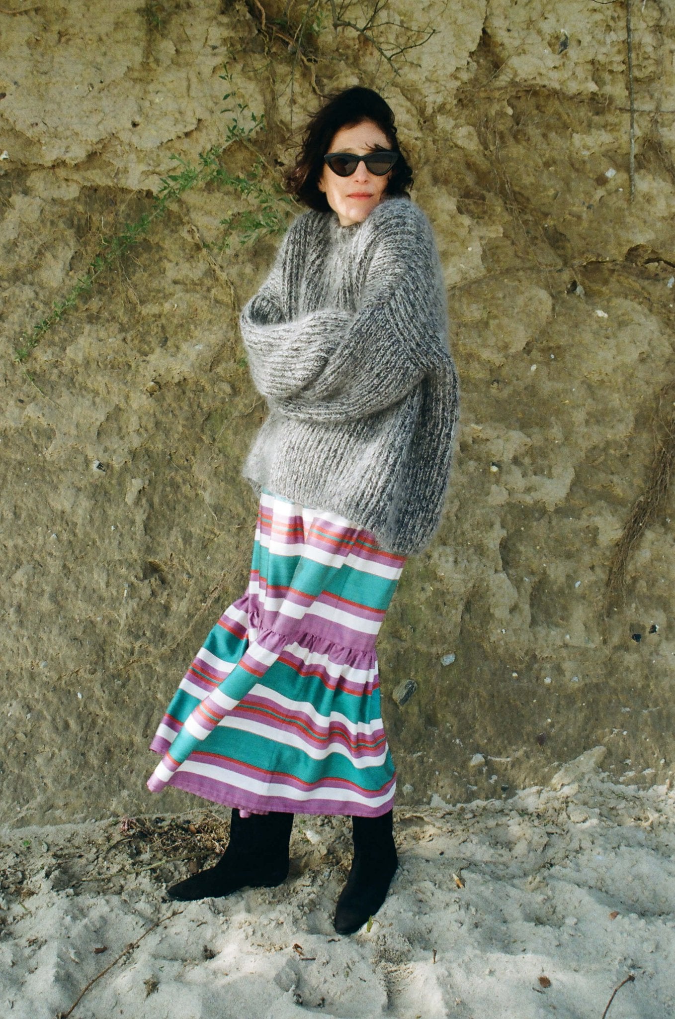 Berenika skirt worn side — model wearing Aleksandra Viktor handwoven silk ikat skirt, sustainably crafted in Uzbekistan