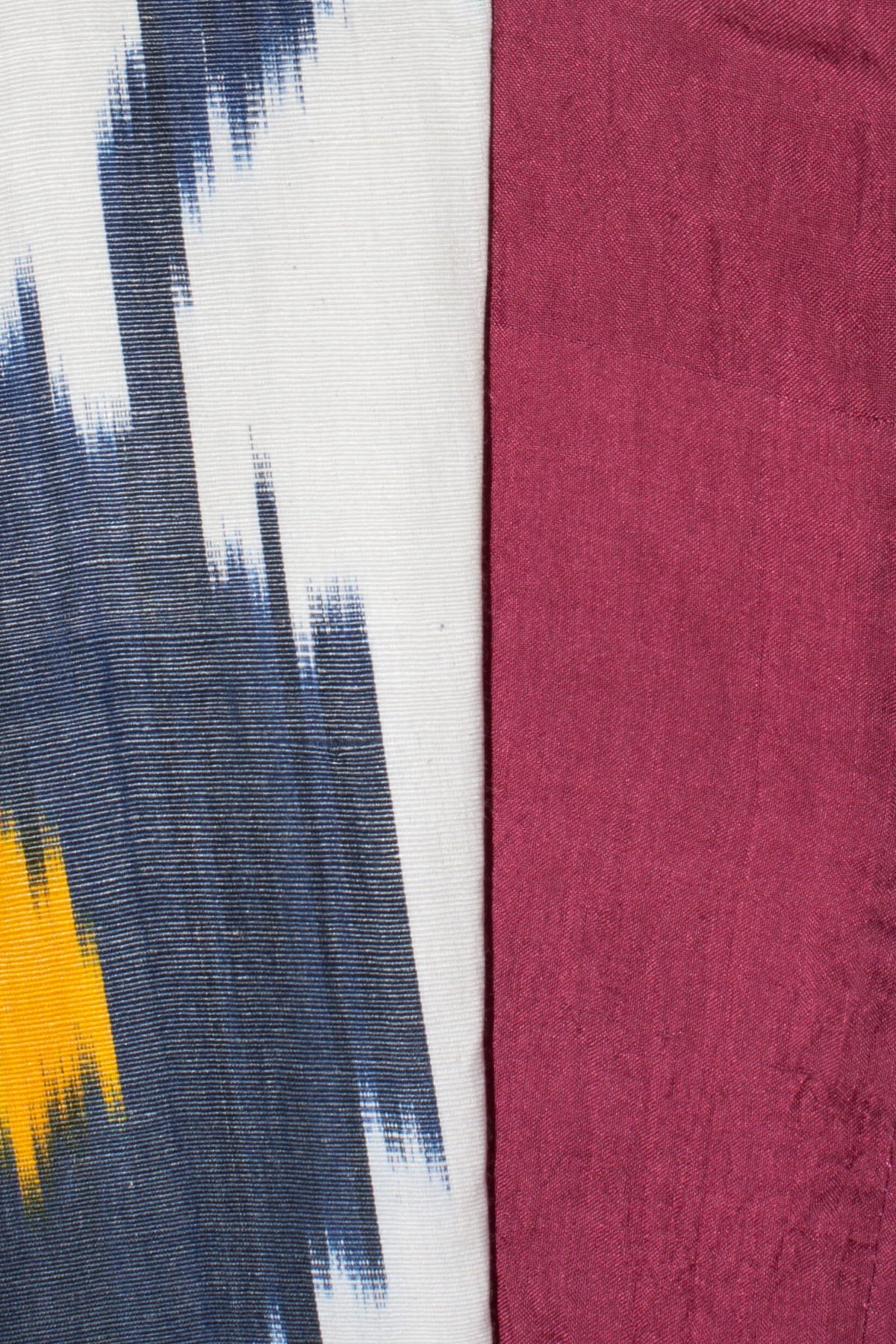 Tatjana silk coat fabric close-up — handwoven ikat weaving detail by Aleksandra Viktor master artisans in Uzbekistan