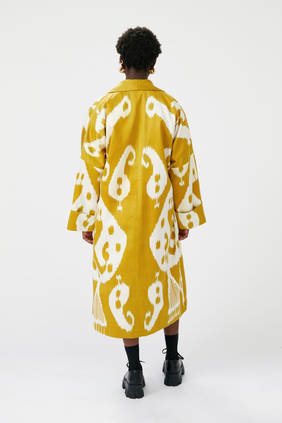 Marta silk coat worn back — model wearing Aleksandra Viktor exclusively tailored luxury ikat silk coat