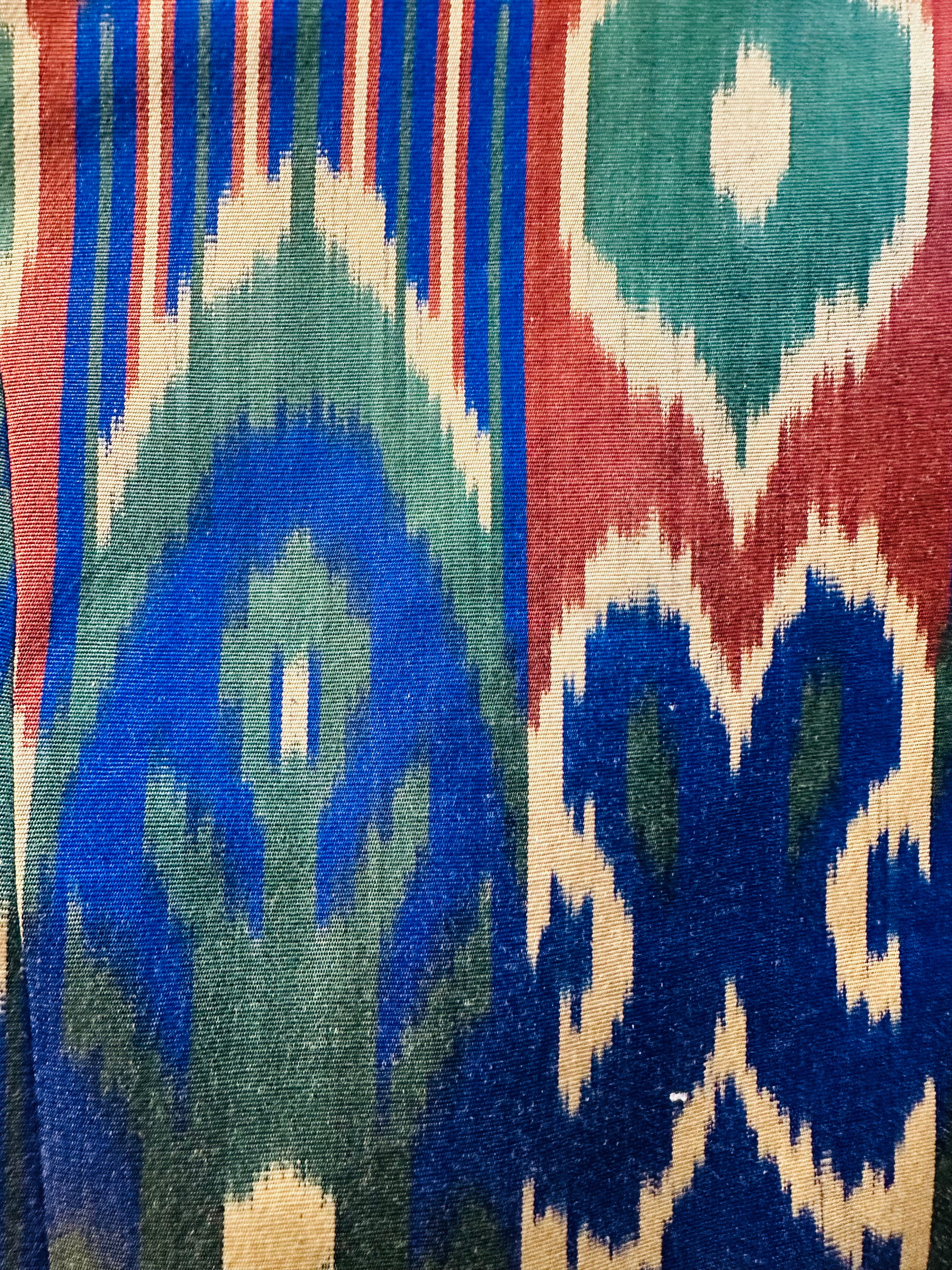 Anna Short Coat fabric detail — handwoven ikat pattern close-up by Aleksandra Viktor