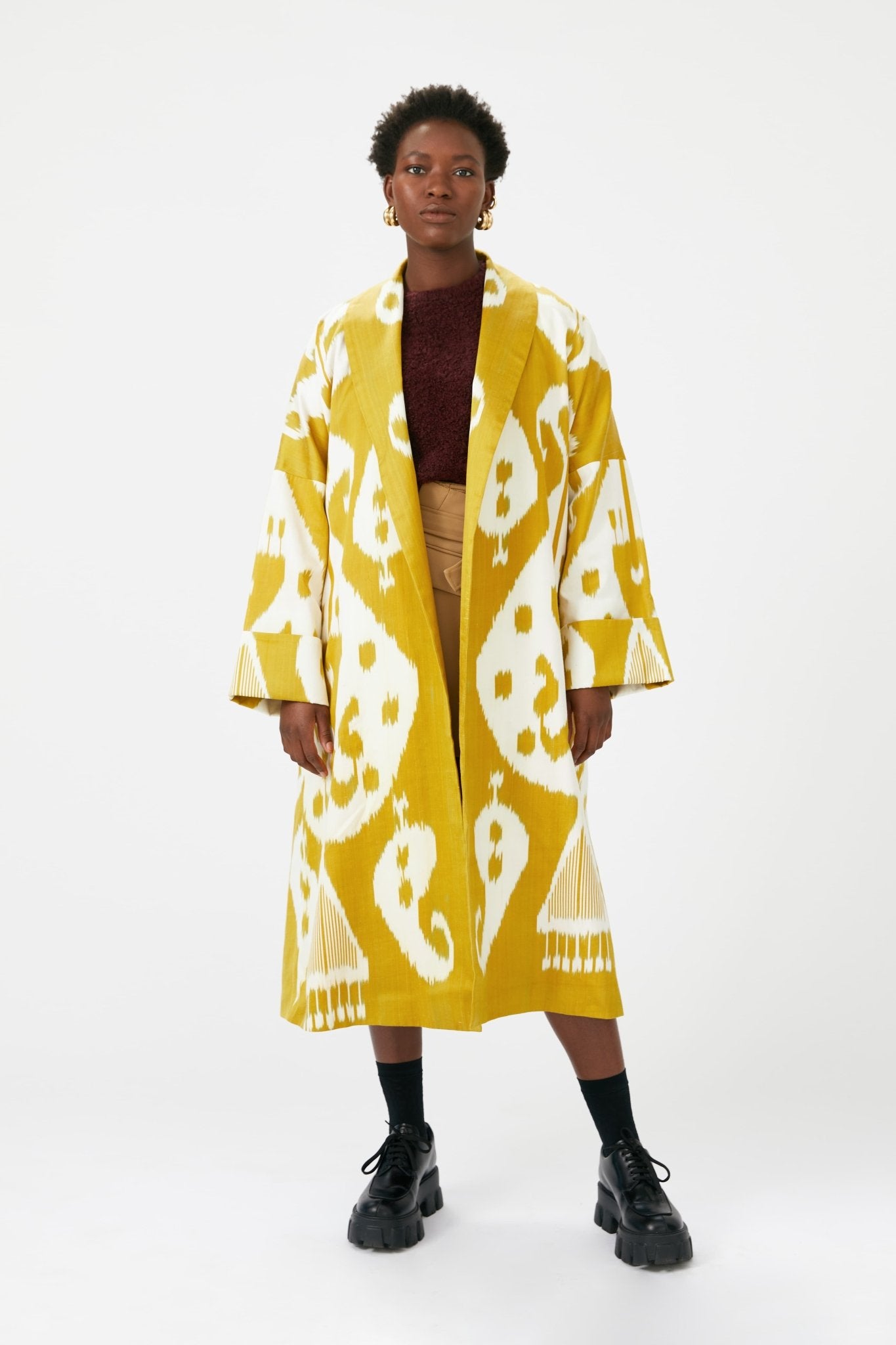 Marta silk coat worn front — model wearing Aleksandra Viktor exclusively tailored luxury ikat silk coat