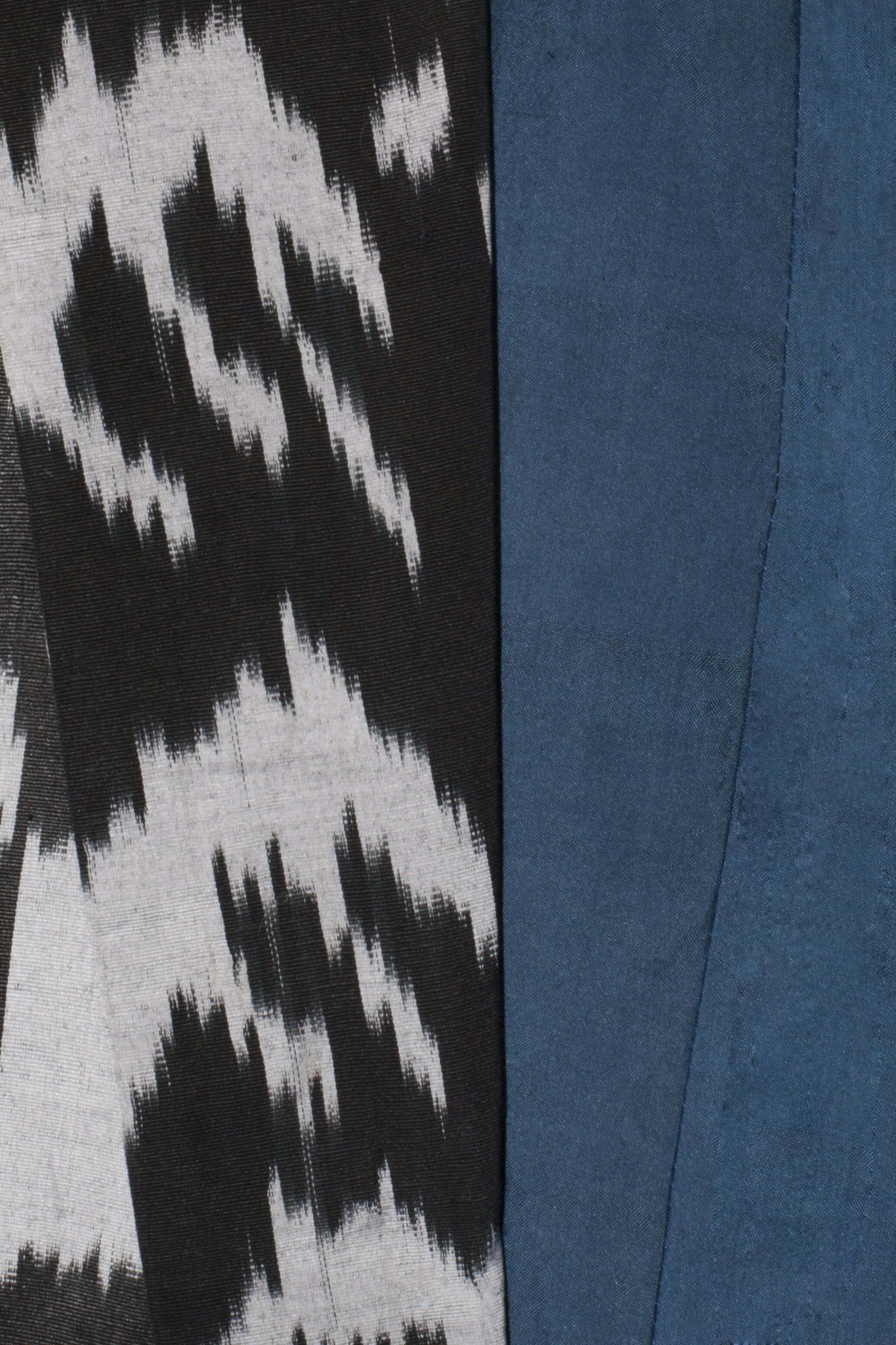 Vida silk coat fabric detail — handloom woven silk cotton ikat by Aleksandra Viktor