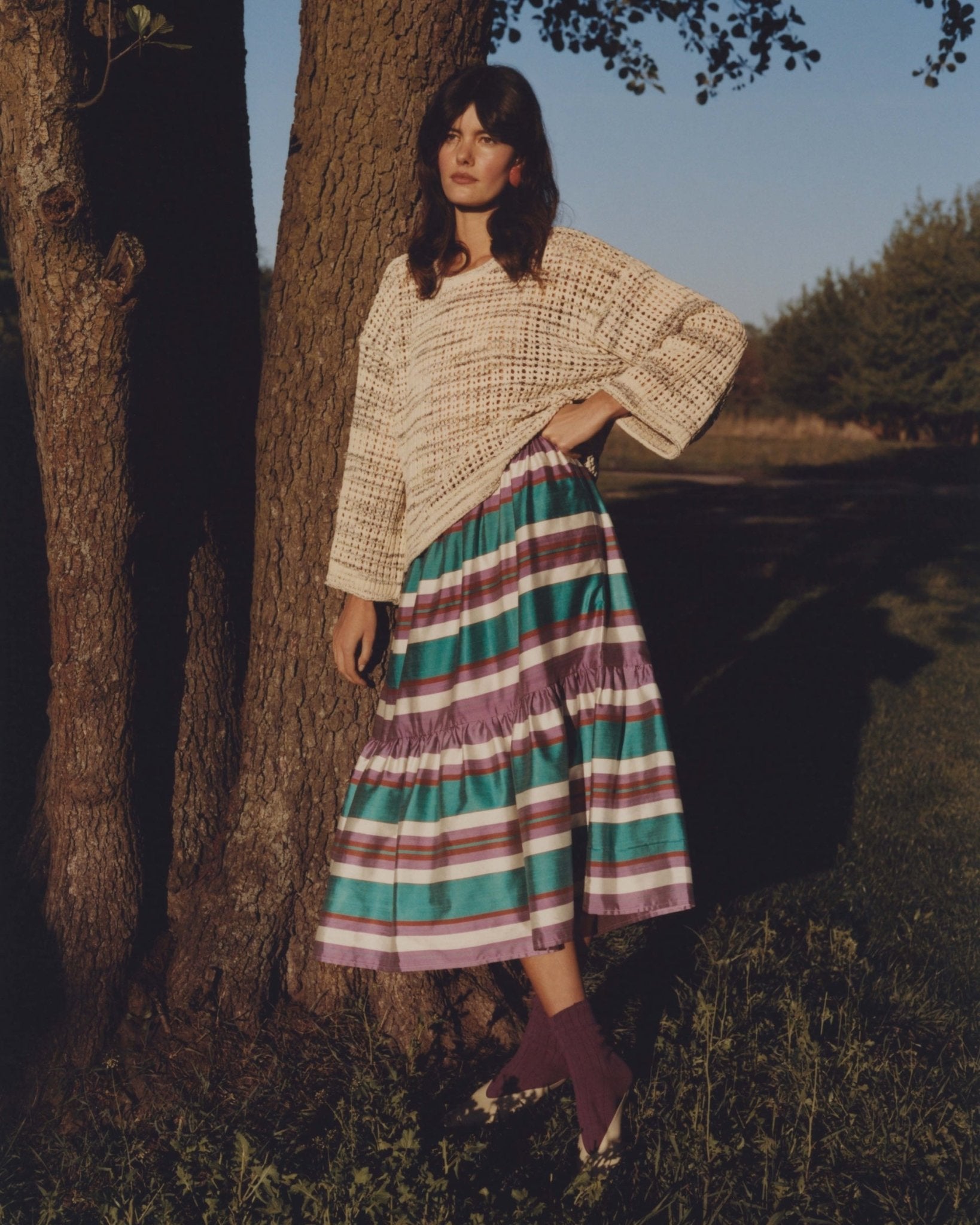 Berenika skirt worn side — model wearing Aleksandra Viktor handwoven silk ikat skirt, sustainably crafted in Uzbekistan