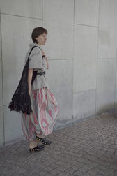 Marysia luxury ikat cotton trousers worn — model wearing Aleksandra Viktor handwoven wide-leg trousers in traditional ikat pattern