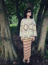 Lara luxury ikat cotton overshirt worn outdoors — Aleksandra Viktor handwoven cotton overshirt in traditional Central Asian ikat pattern