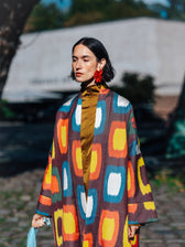 Roberta ikat coat worn open — painterly multicolour ikat with wide sleeves
