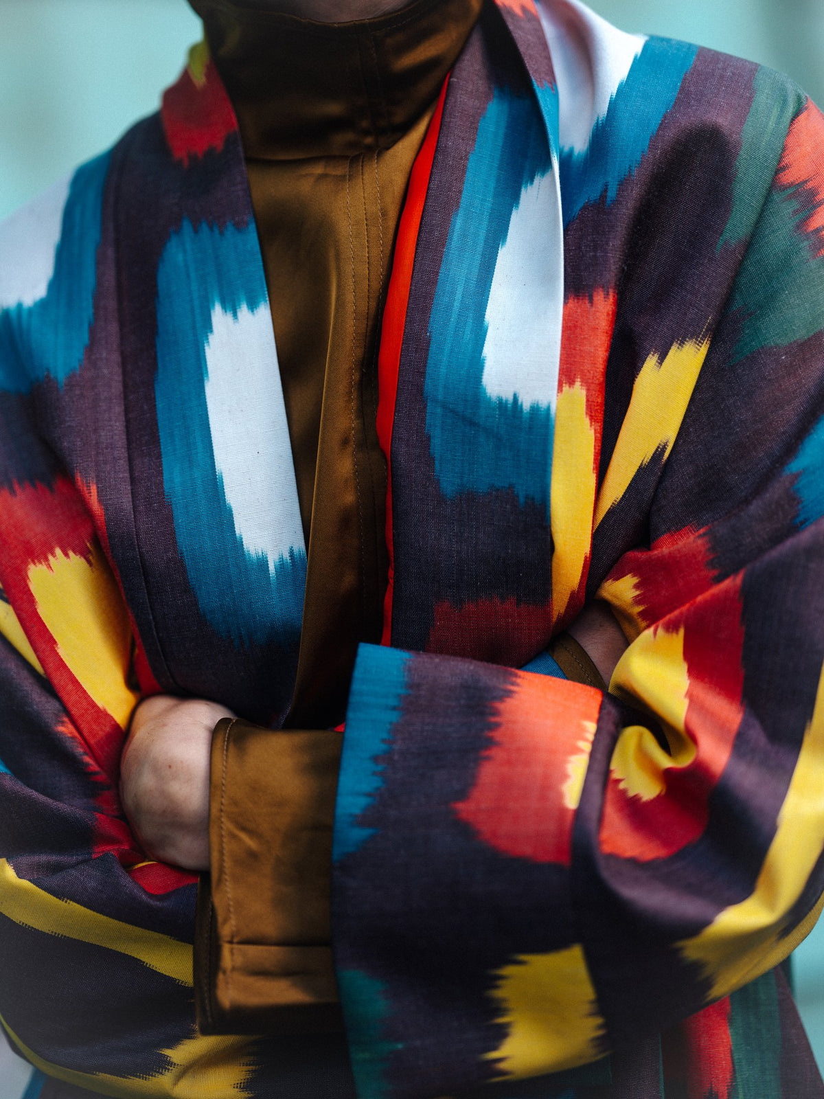 Roberta ikat coat close-up — handwoven ikat colours and collar detail