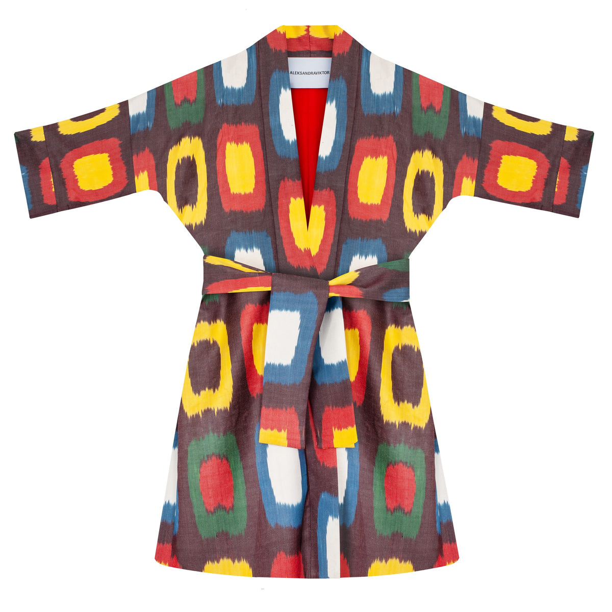 Roberta ikat coat flat lay with belt — multicolour handwoven ikat on aubergine with red lining, Aleksandra Viktor