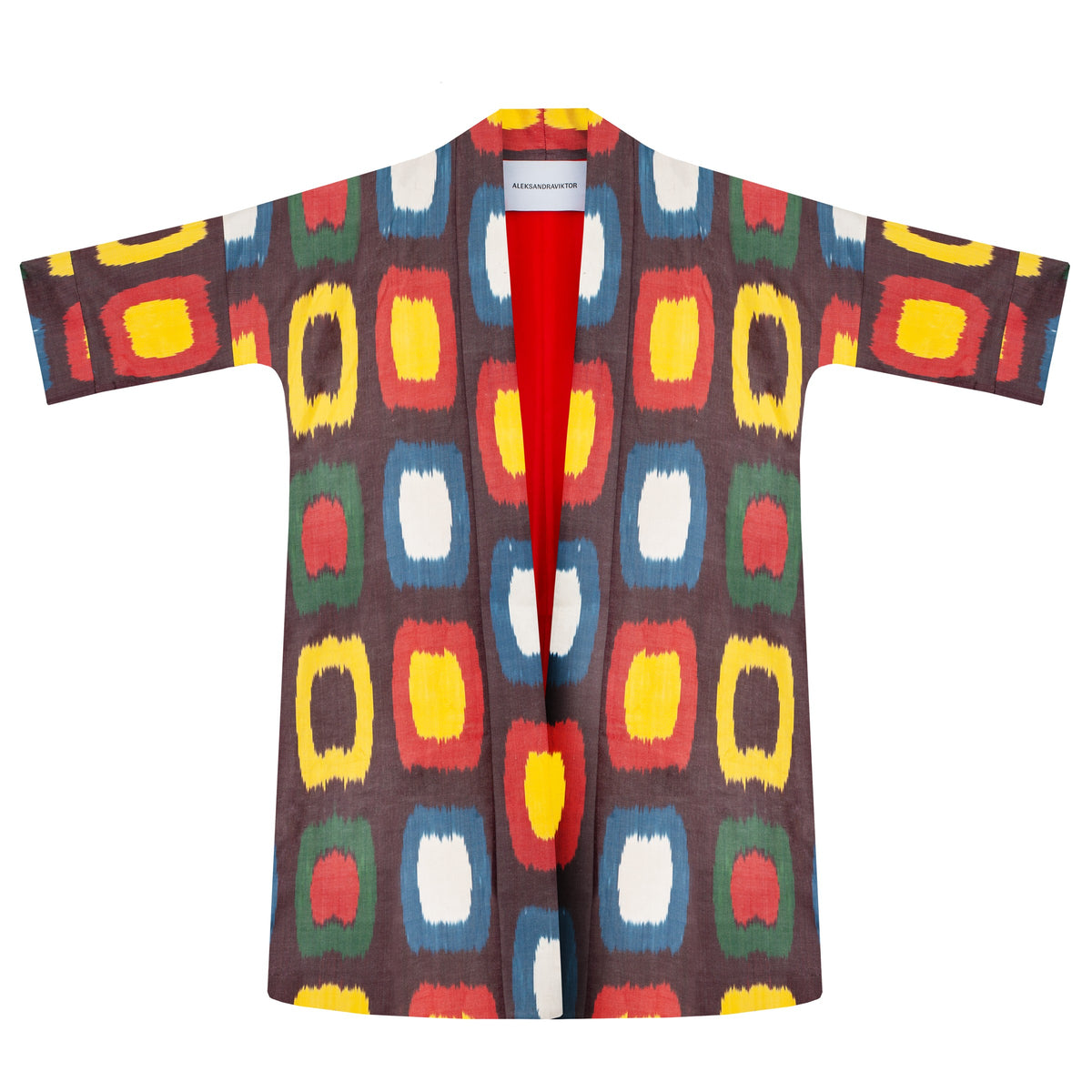 Roberta ikat coat flat lay front, open — yellow, red, blue, green and white ikat, red lining