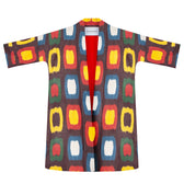Roberta ikat coat flat lay front, open — yellow, red, blue, green and white ikat, red lining